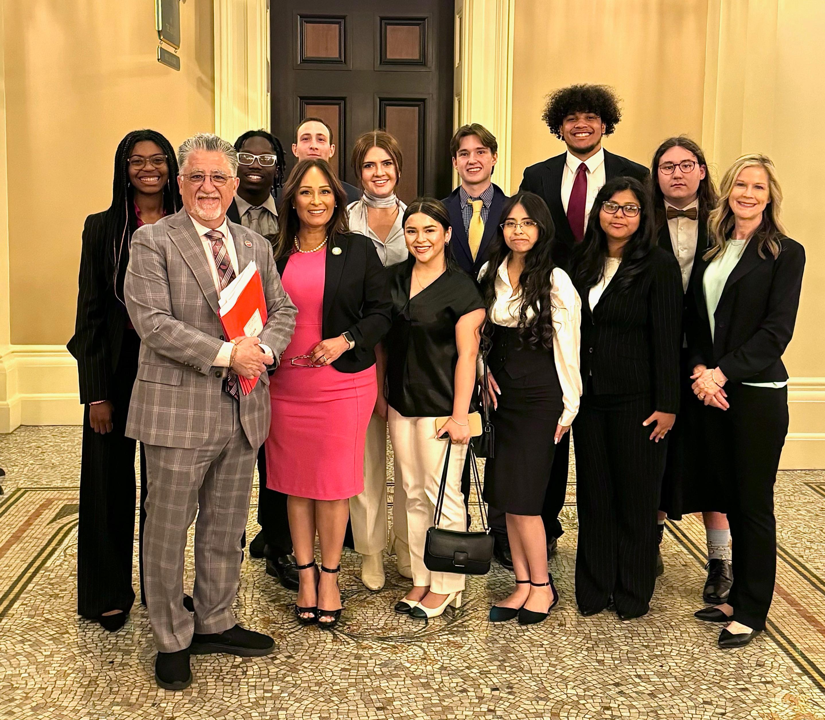a group of people posing for a photo