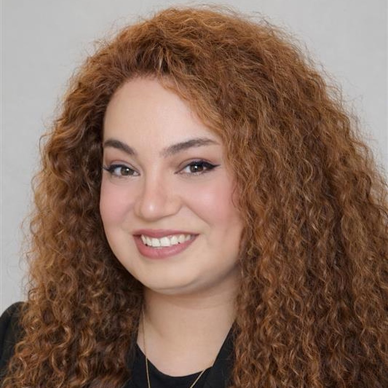 a person with long curly hair