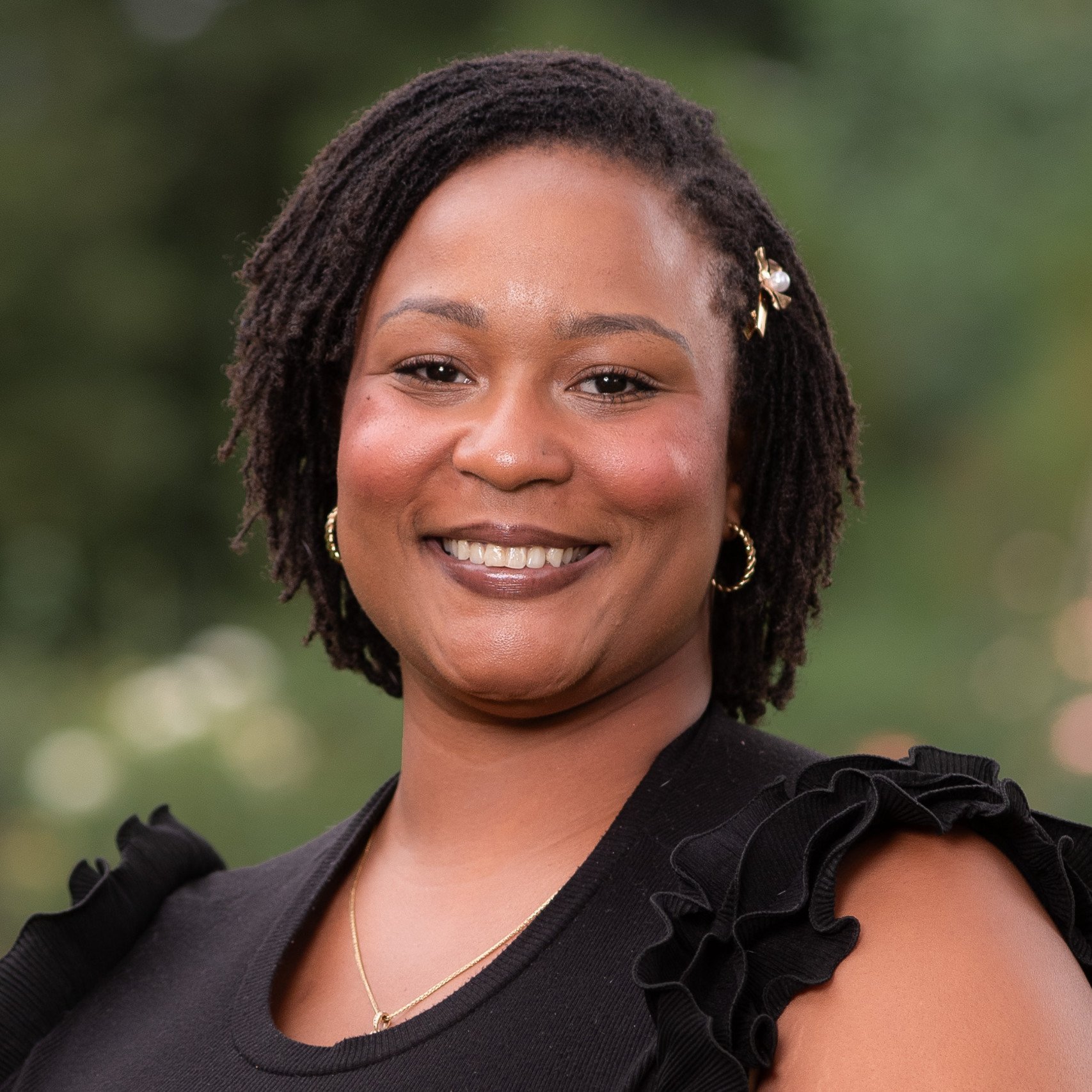 a woman smiling at camera