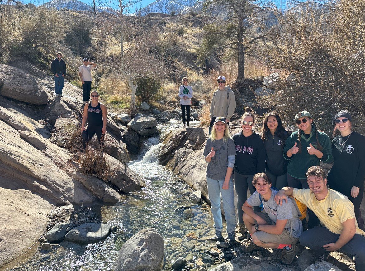 a group of people posing for a photo