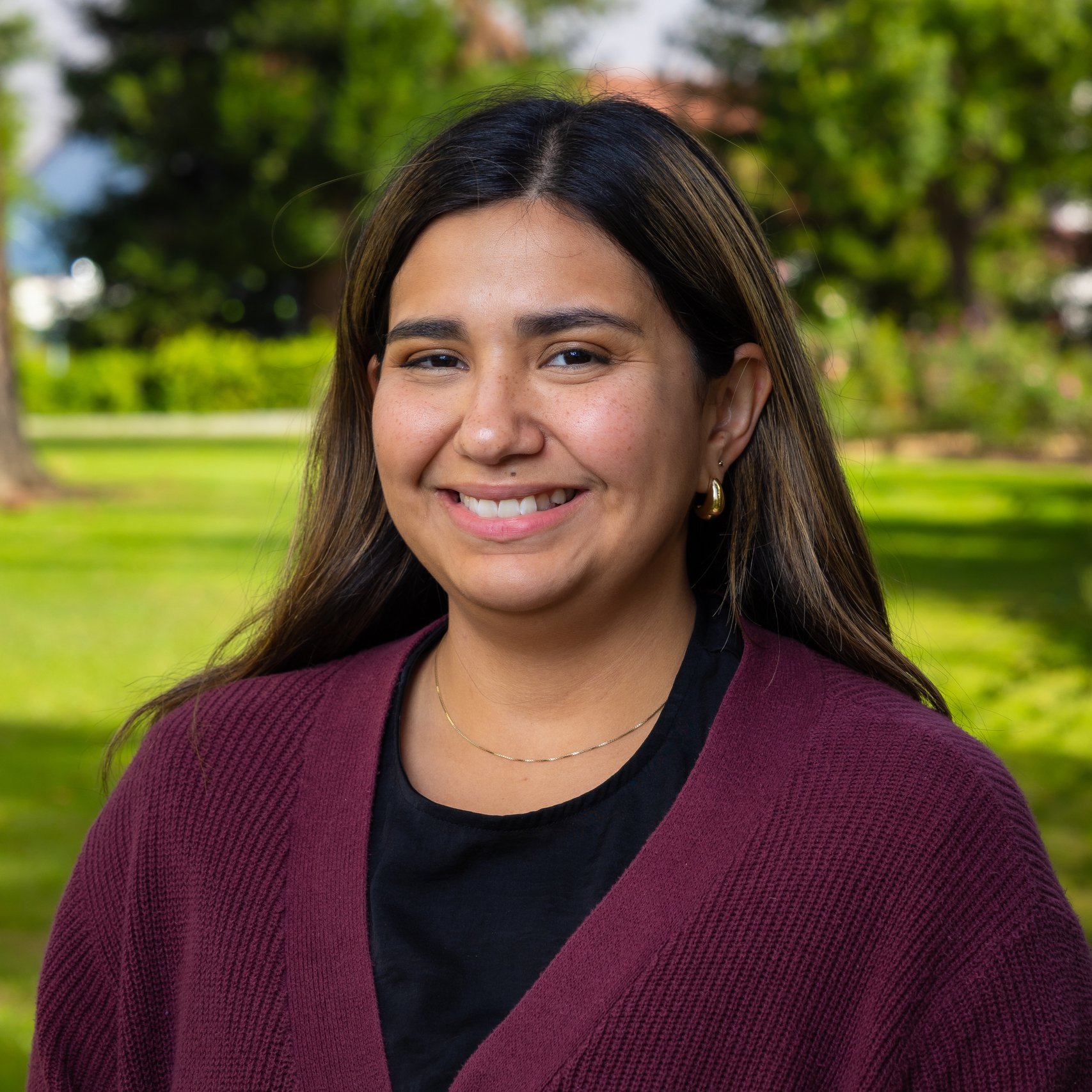 a woman smiling at camera