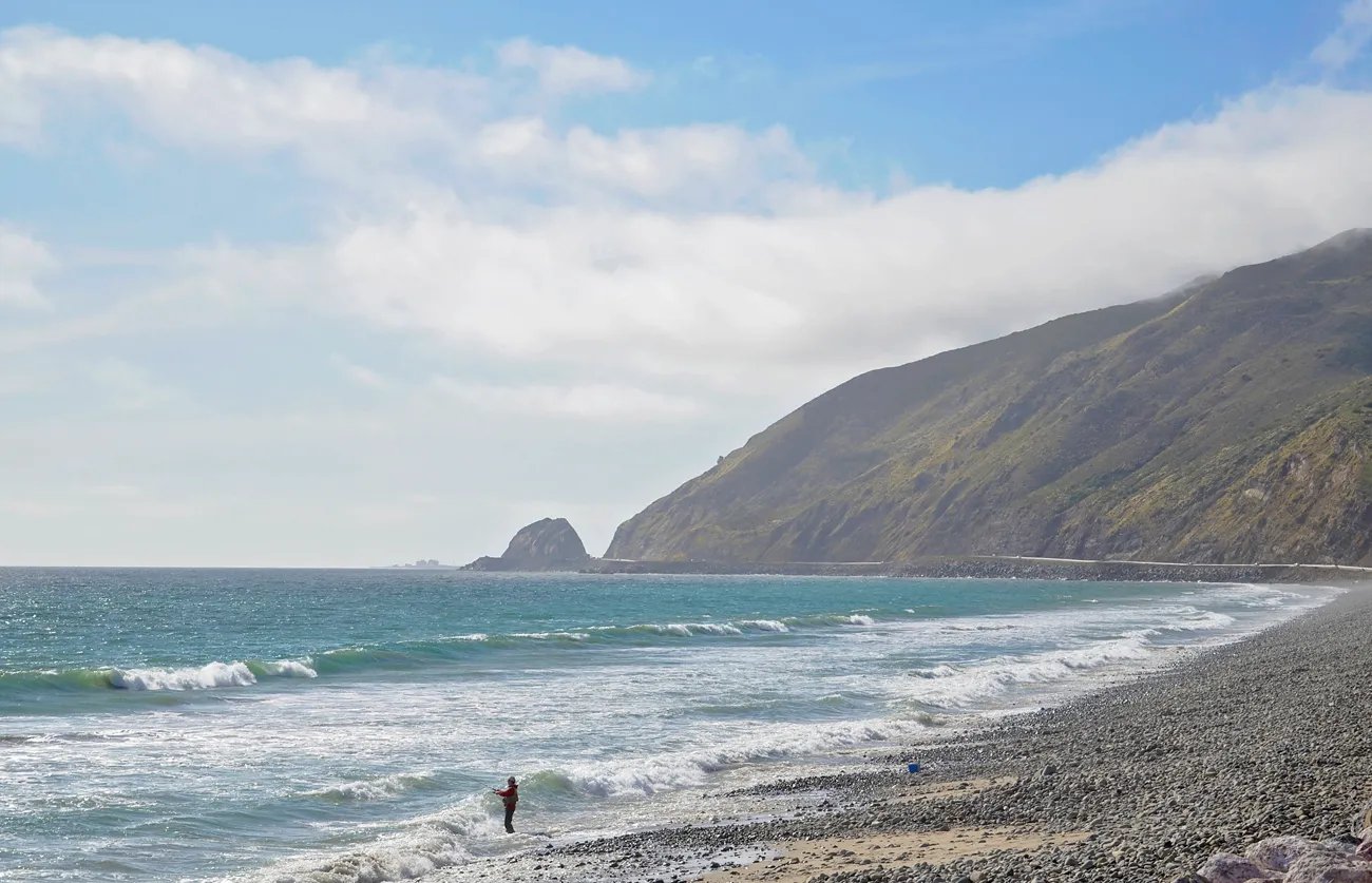 a person standing on a beach