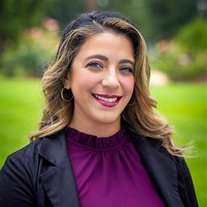 a woman in a purple shirt