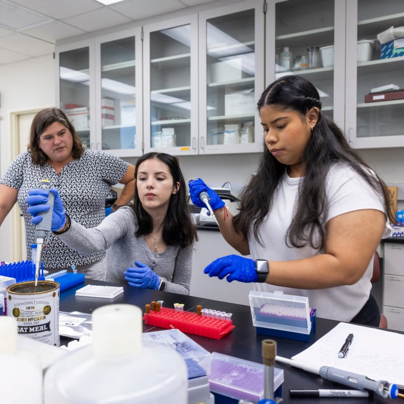 a group of women in a lab