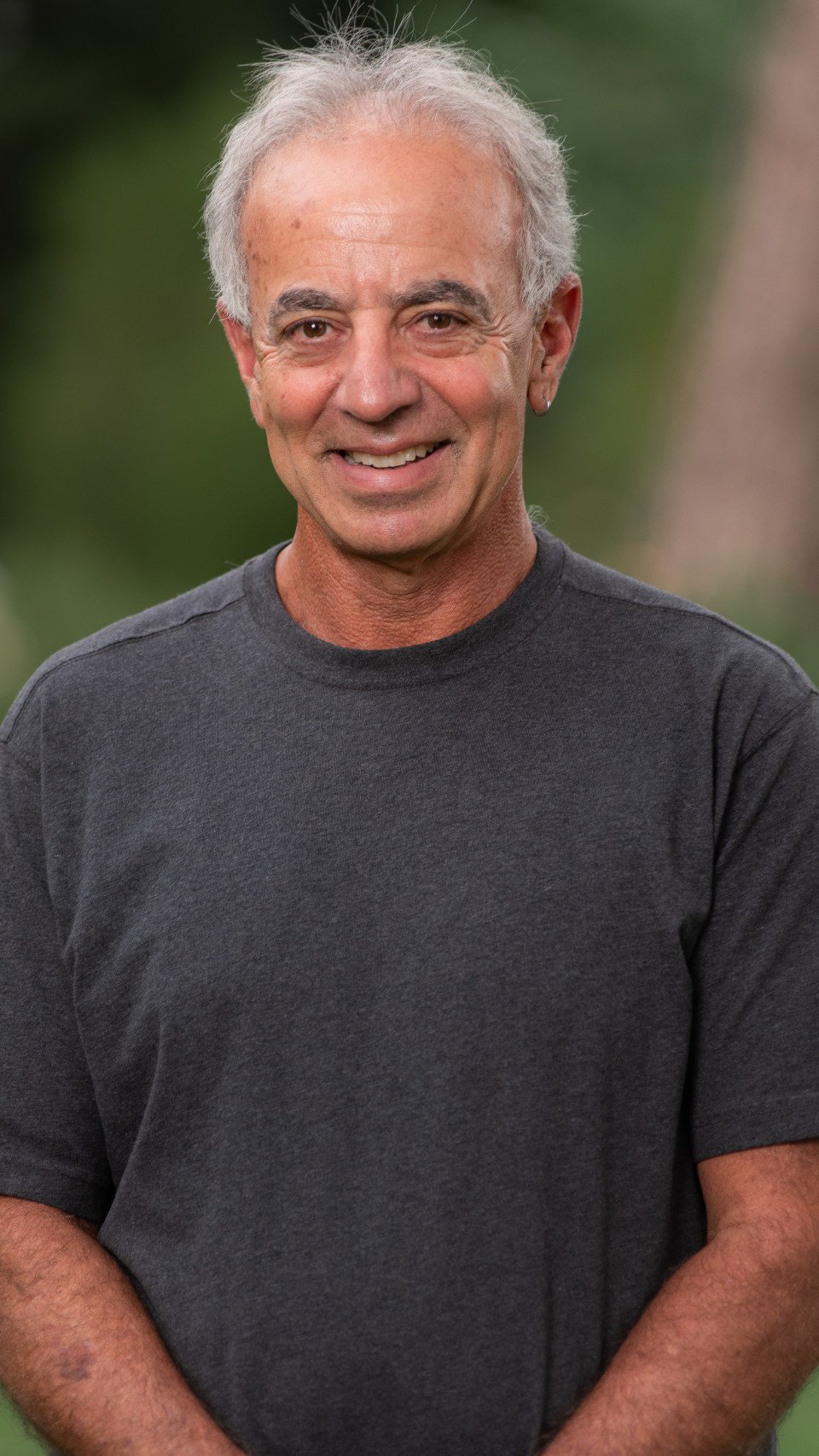 a man smiling for a picture