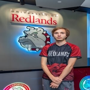 a man standing in front of a sign