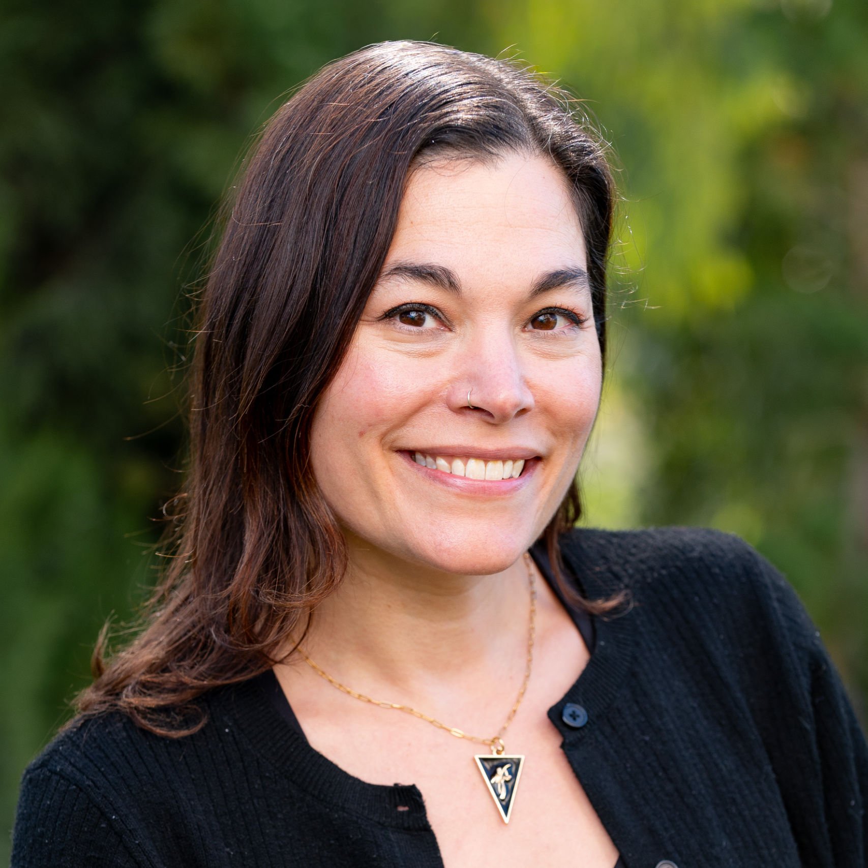 a woman smiling for a picture