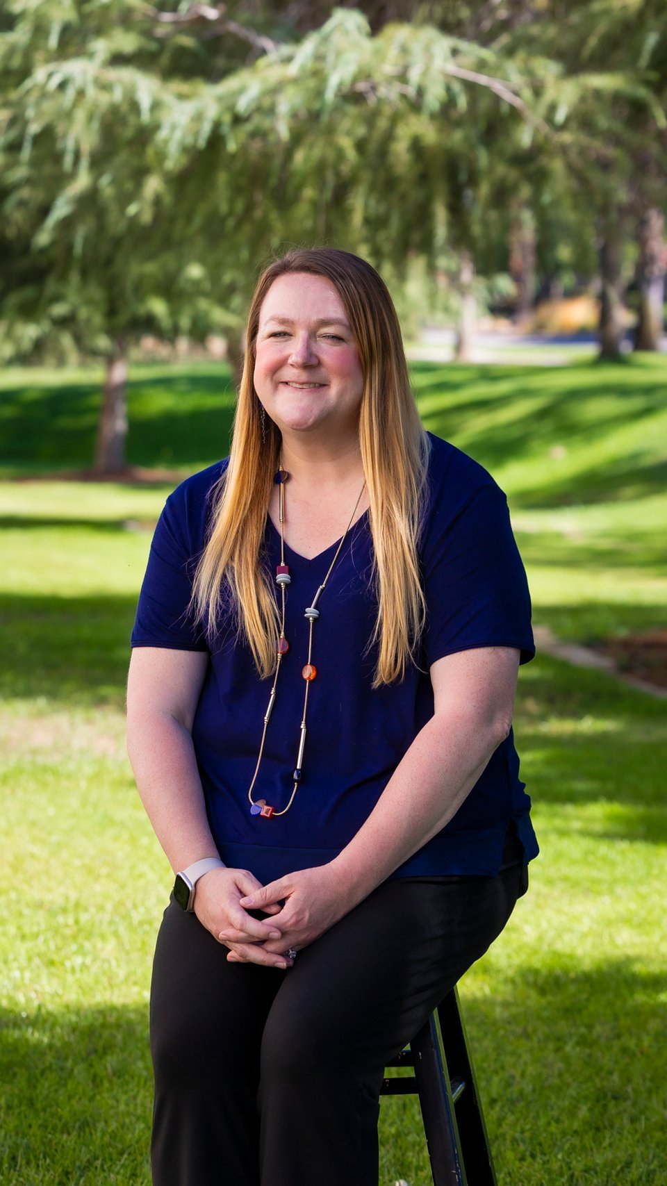a woman in a blue shirt