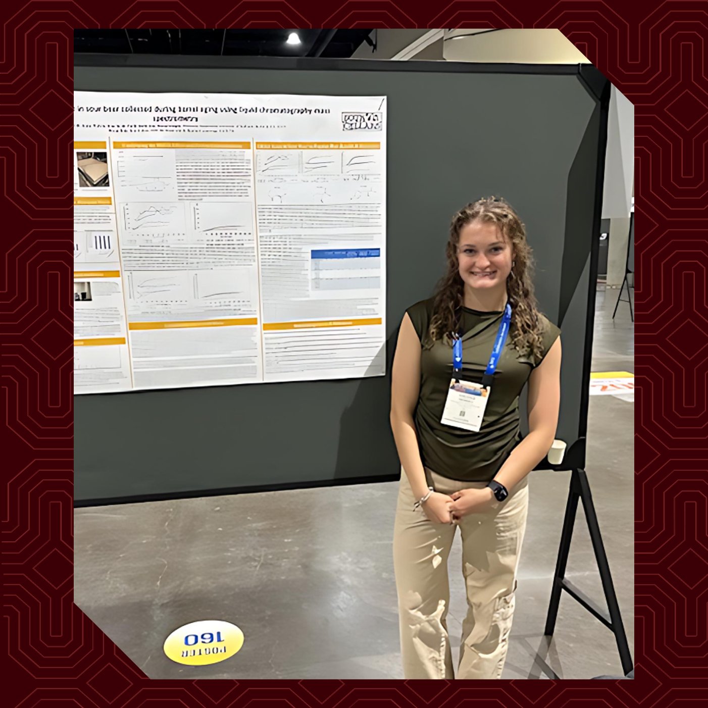 a woman standing in front of a board