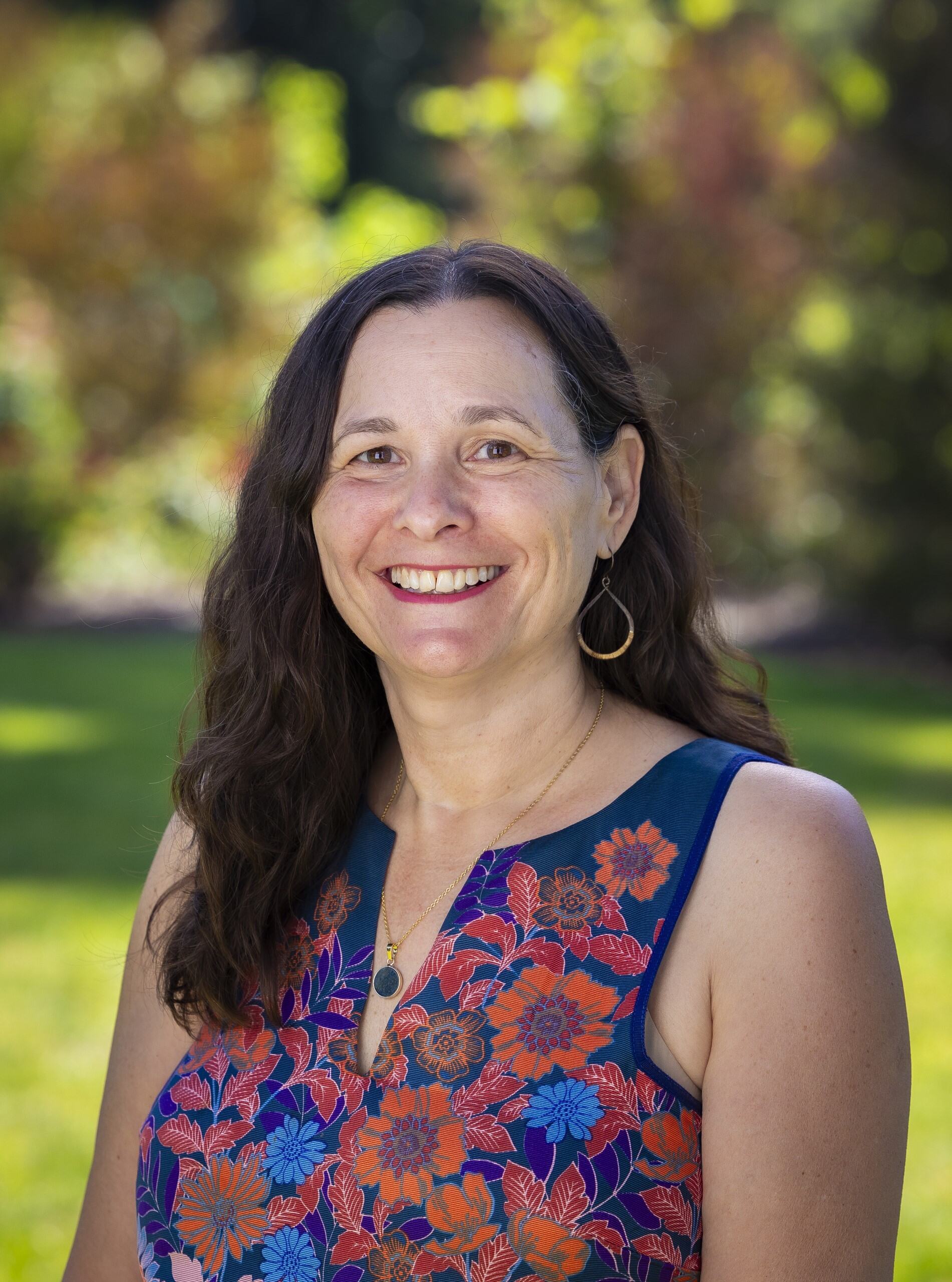 a woman smiling at camera