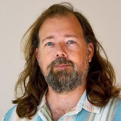 a man with long hair and beard