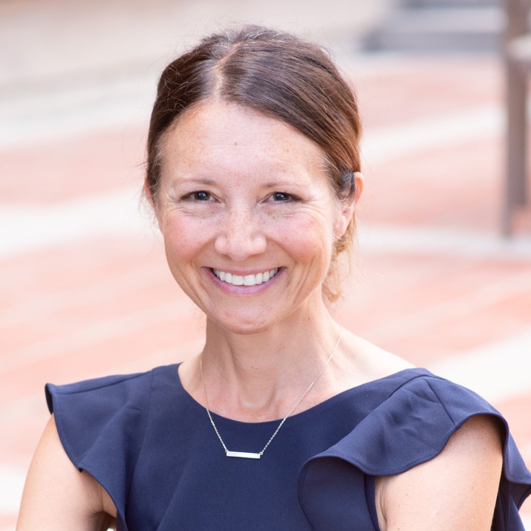 a woman smiling at camera