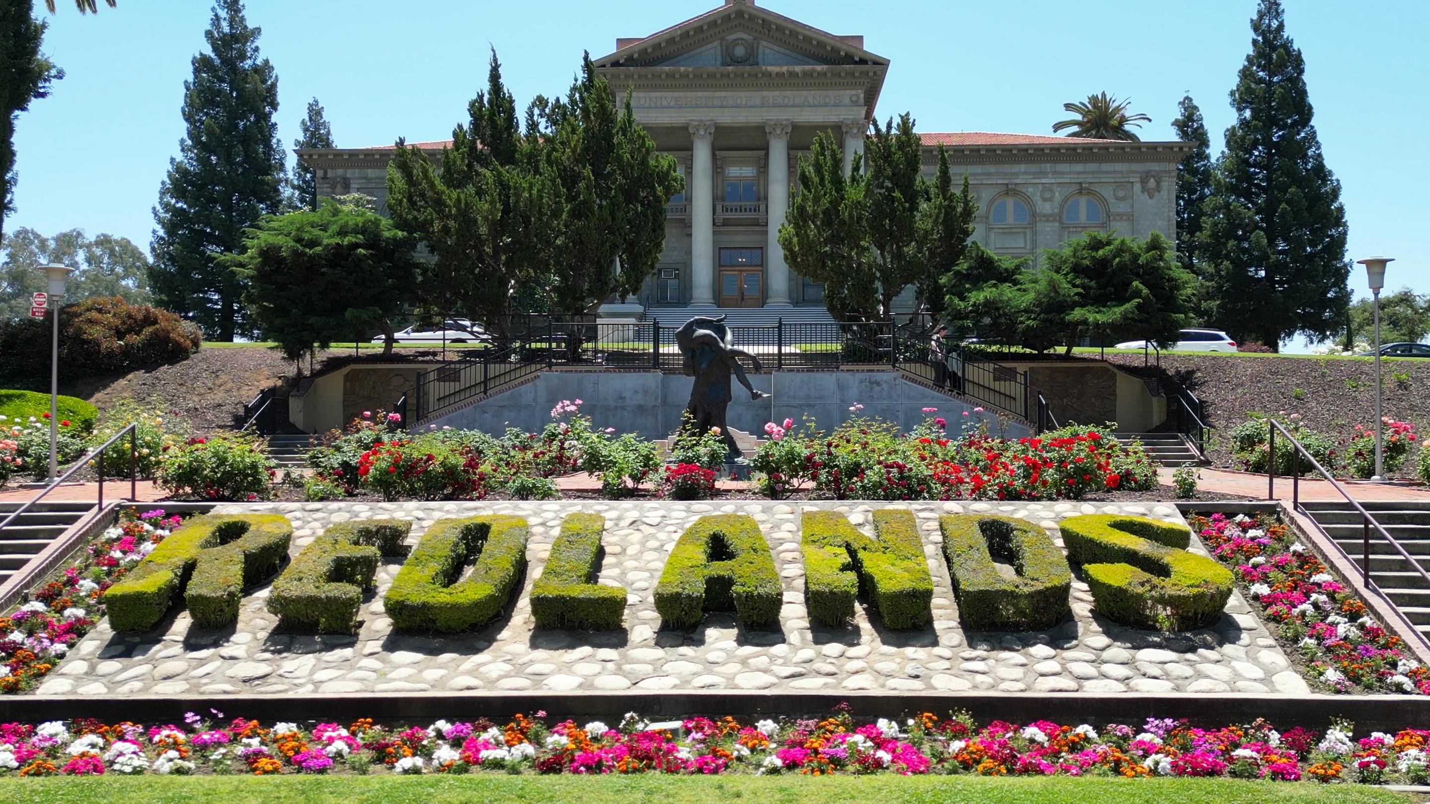 a building with a statue in the background