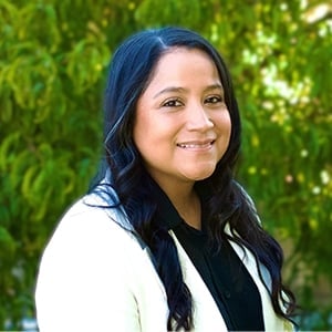 a woman smiling at the camera
