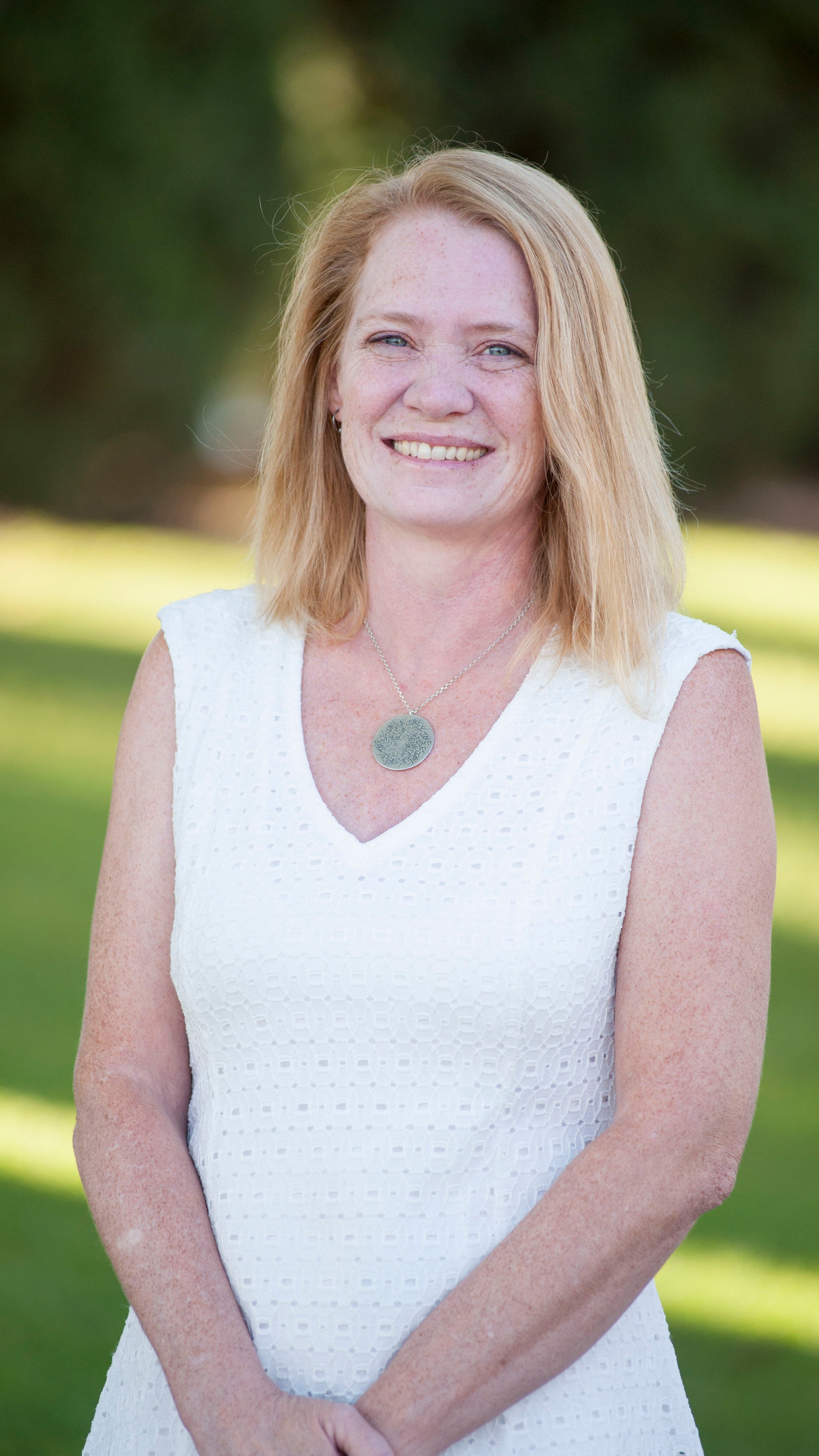 a woman smiling at camera