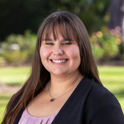 a woman smiling at camera