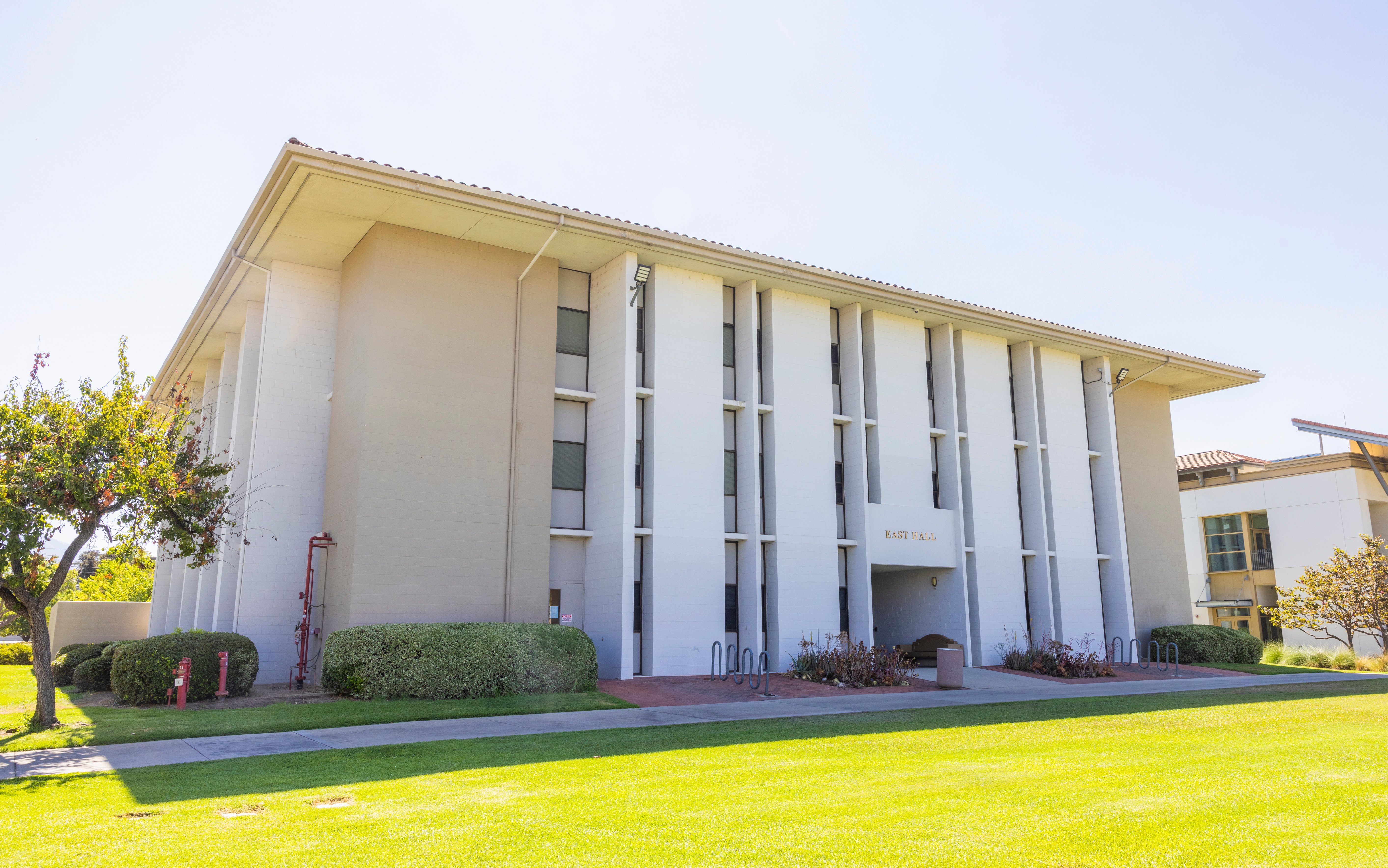 a building with a lawn and grass