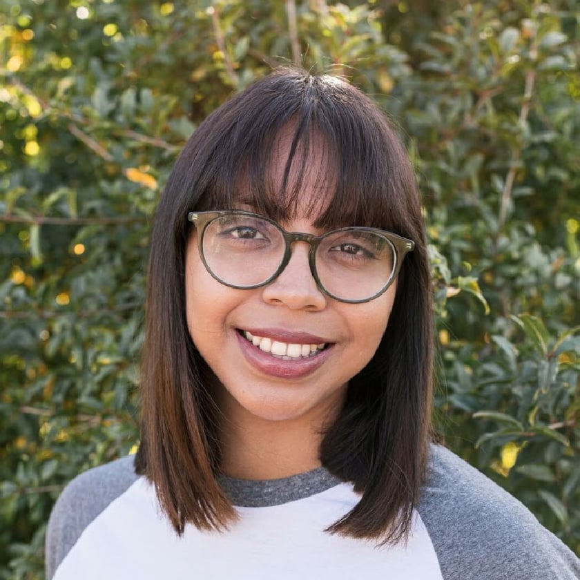 a woman smiling at camera