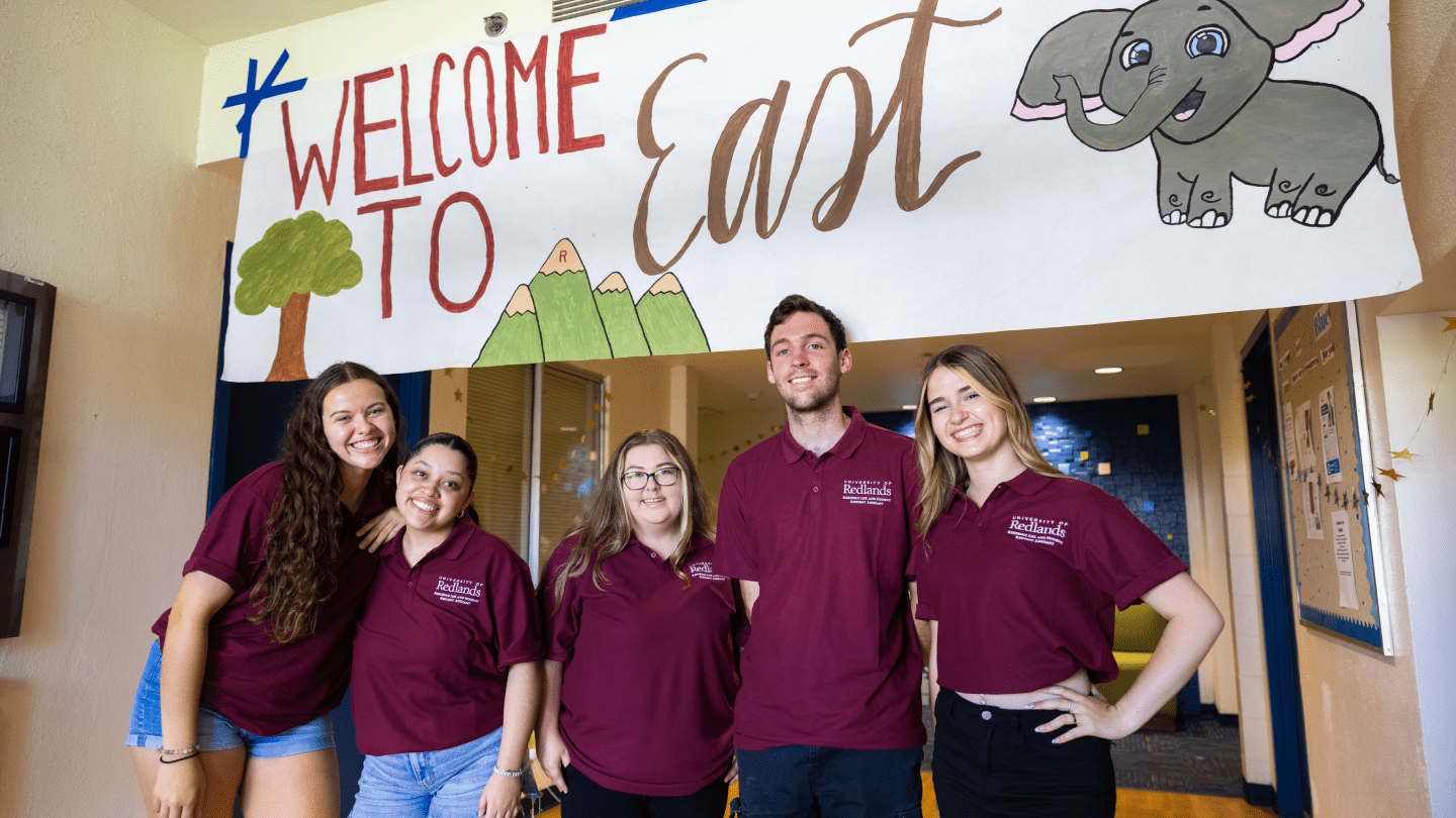 a group of people posing for a photo