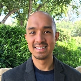 a man smiling for a picture