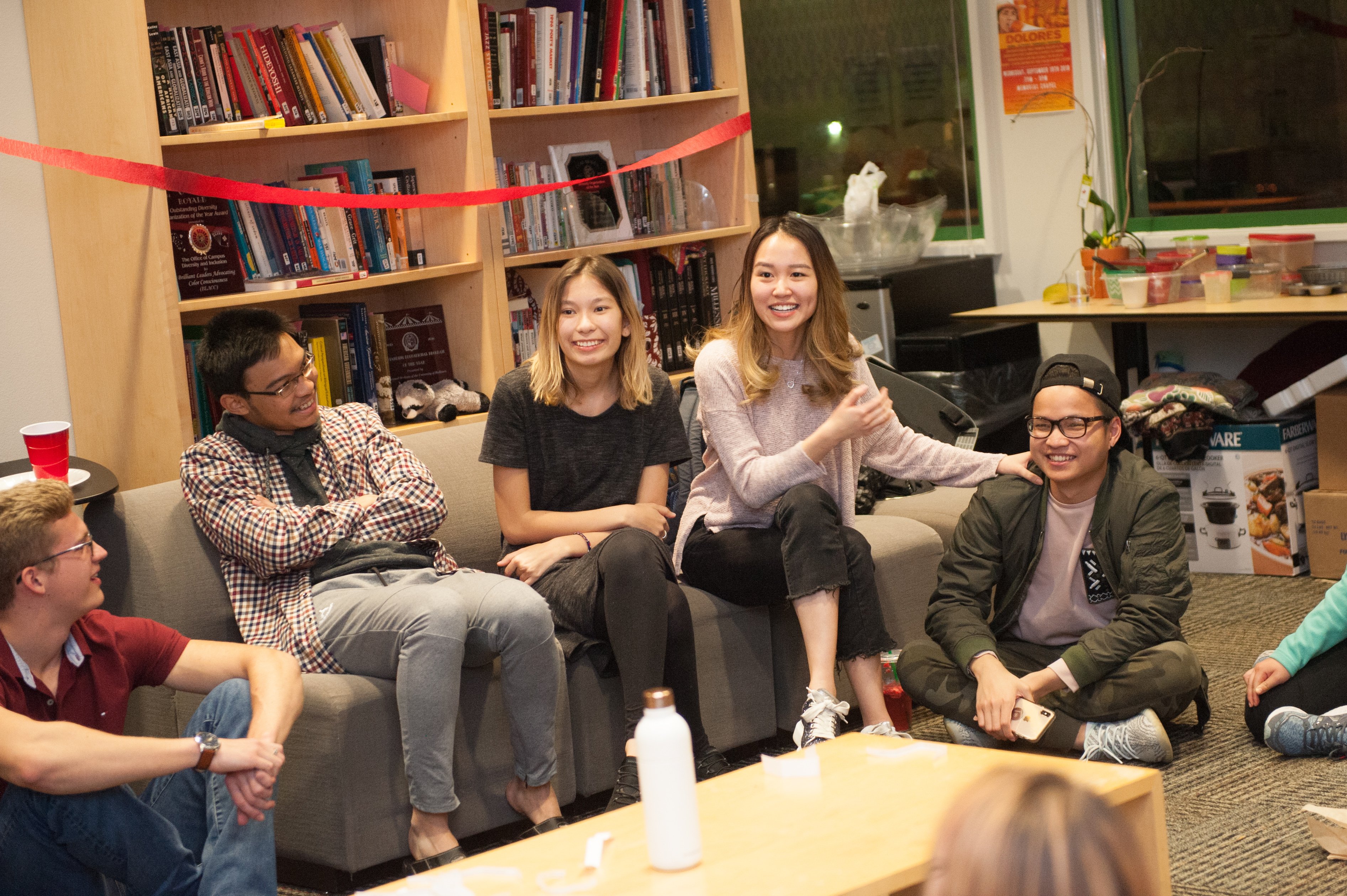 a group of people sitting on a couch