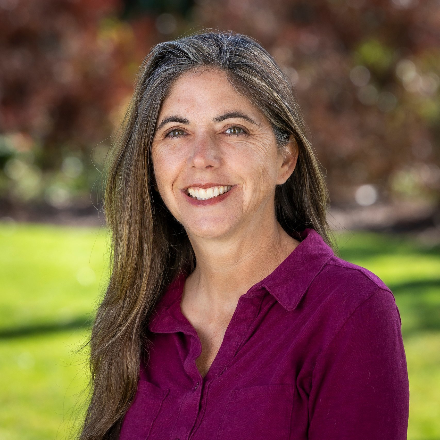 a woman smiling at camera