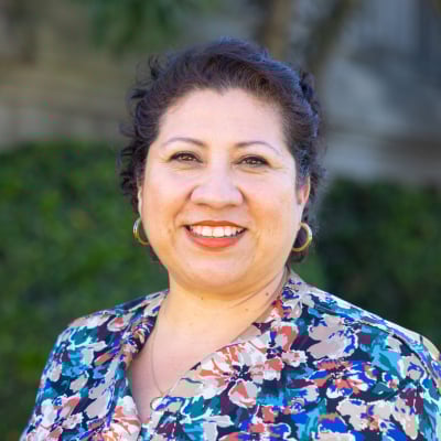 a woman smiling at camera