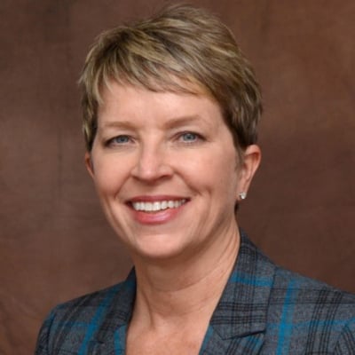 a woman smiling at the camera