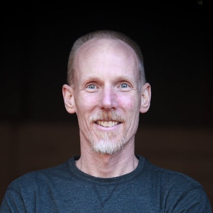 a man smiling for a picture