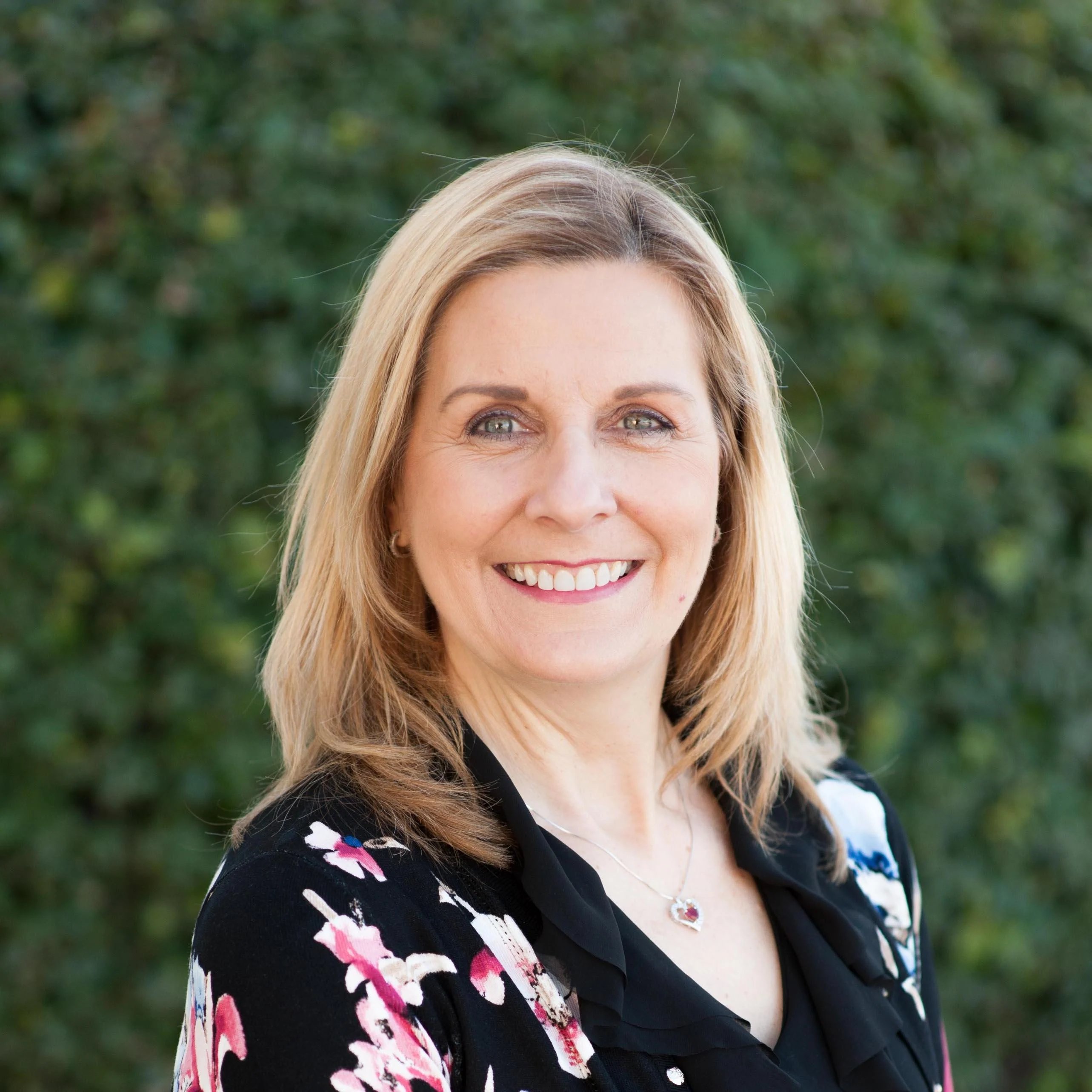 a person smiling at camera