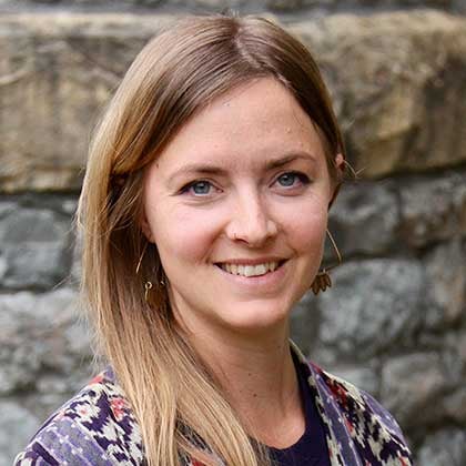 a woman smiling at camera