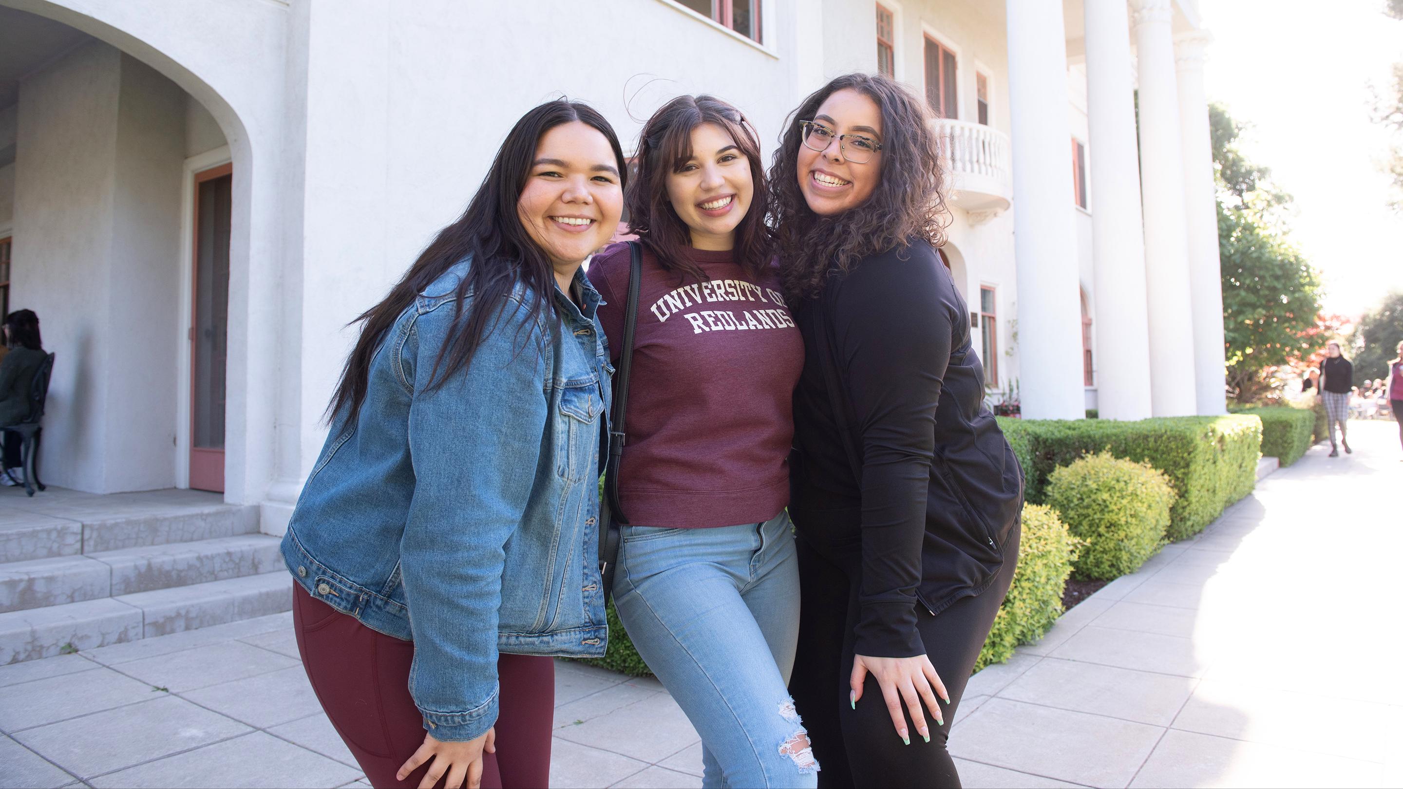 a group of women posing for a picture