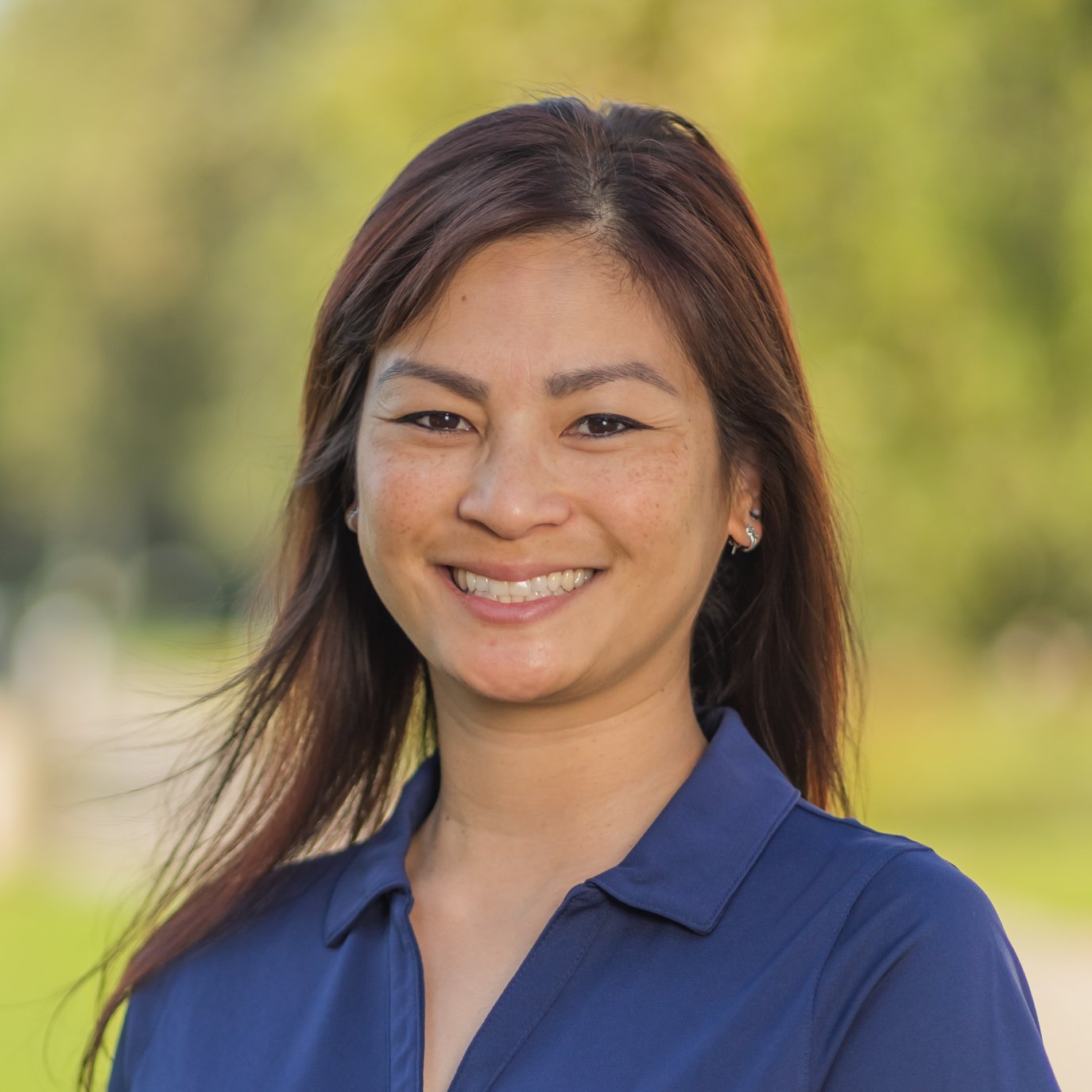 a woman smiling at camera