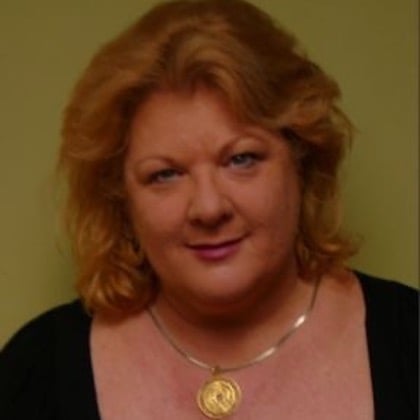 a woman with a necklace