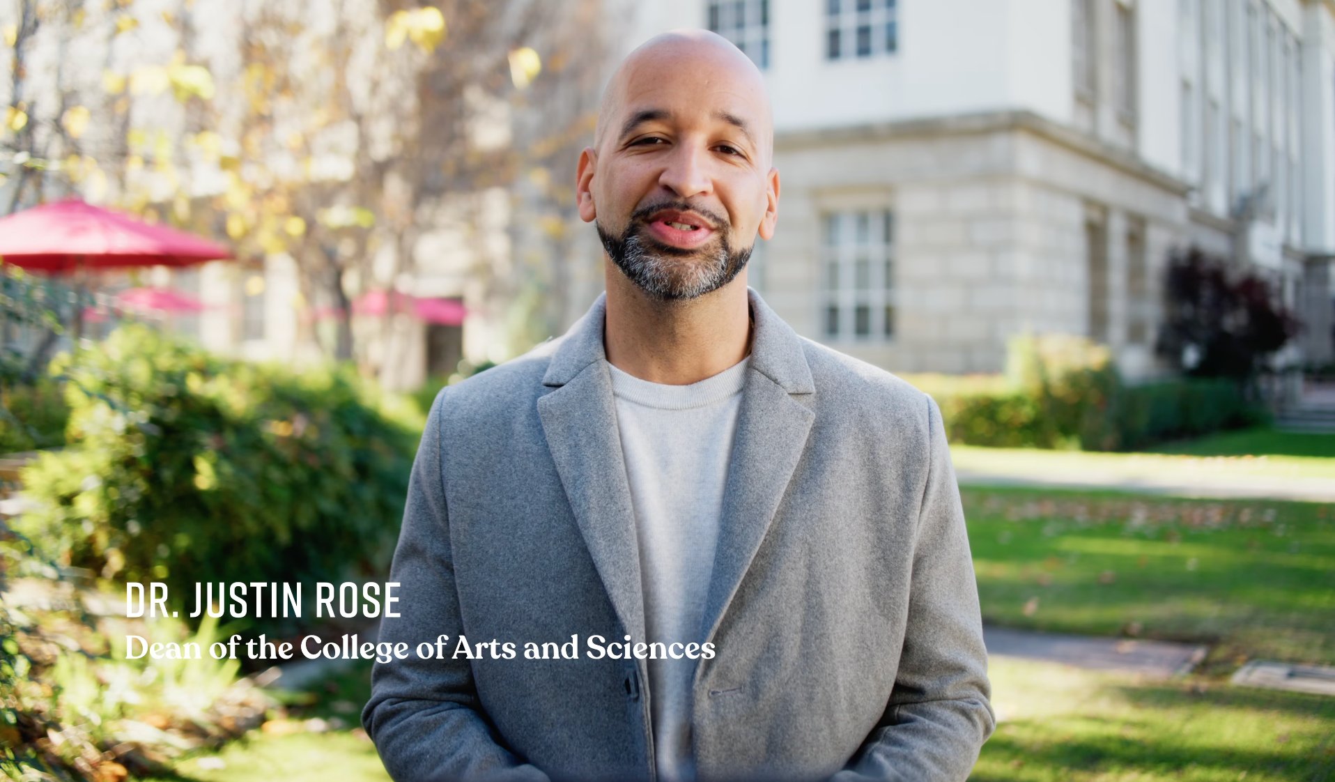 a man in a grey jacket