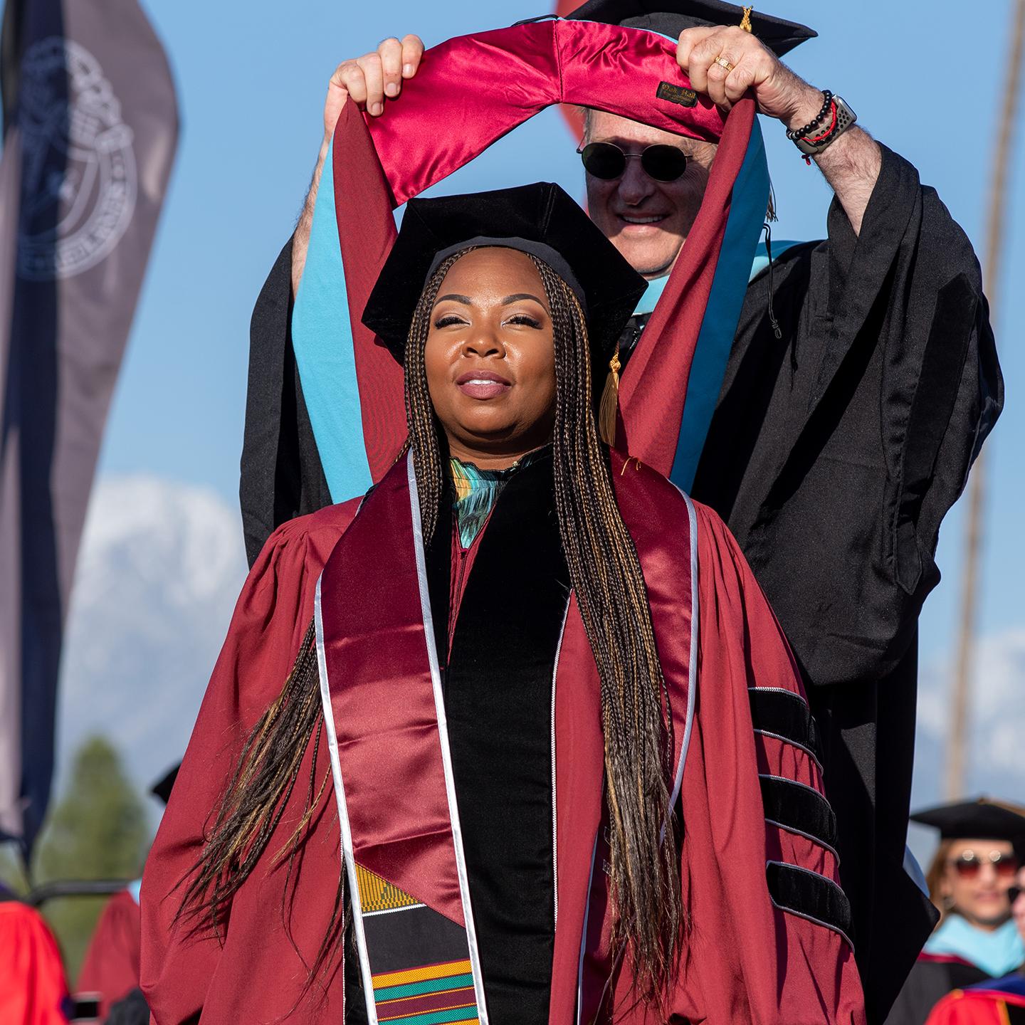 a person in a graduation gown