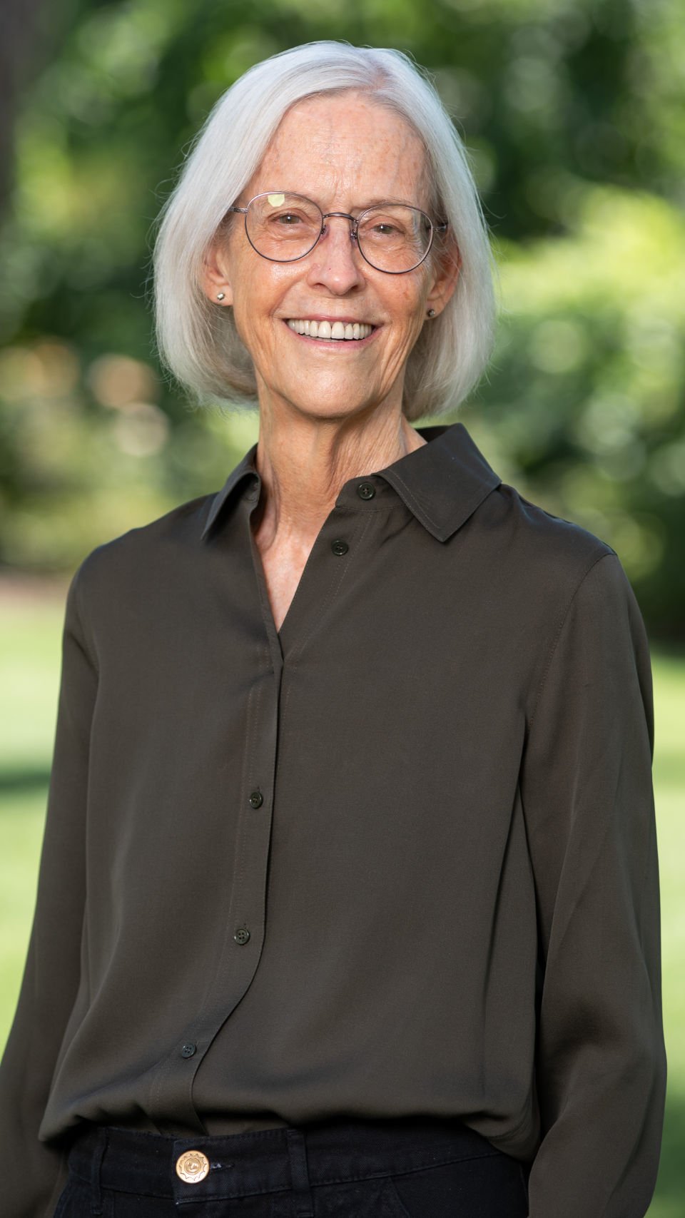 a woman smiling at the camera