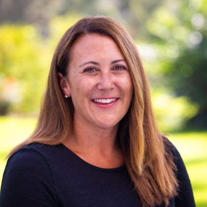a woman smiling at camera