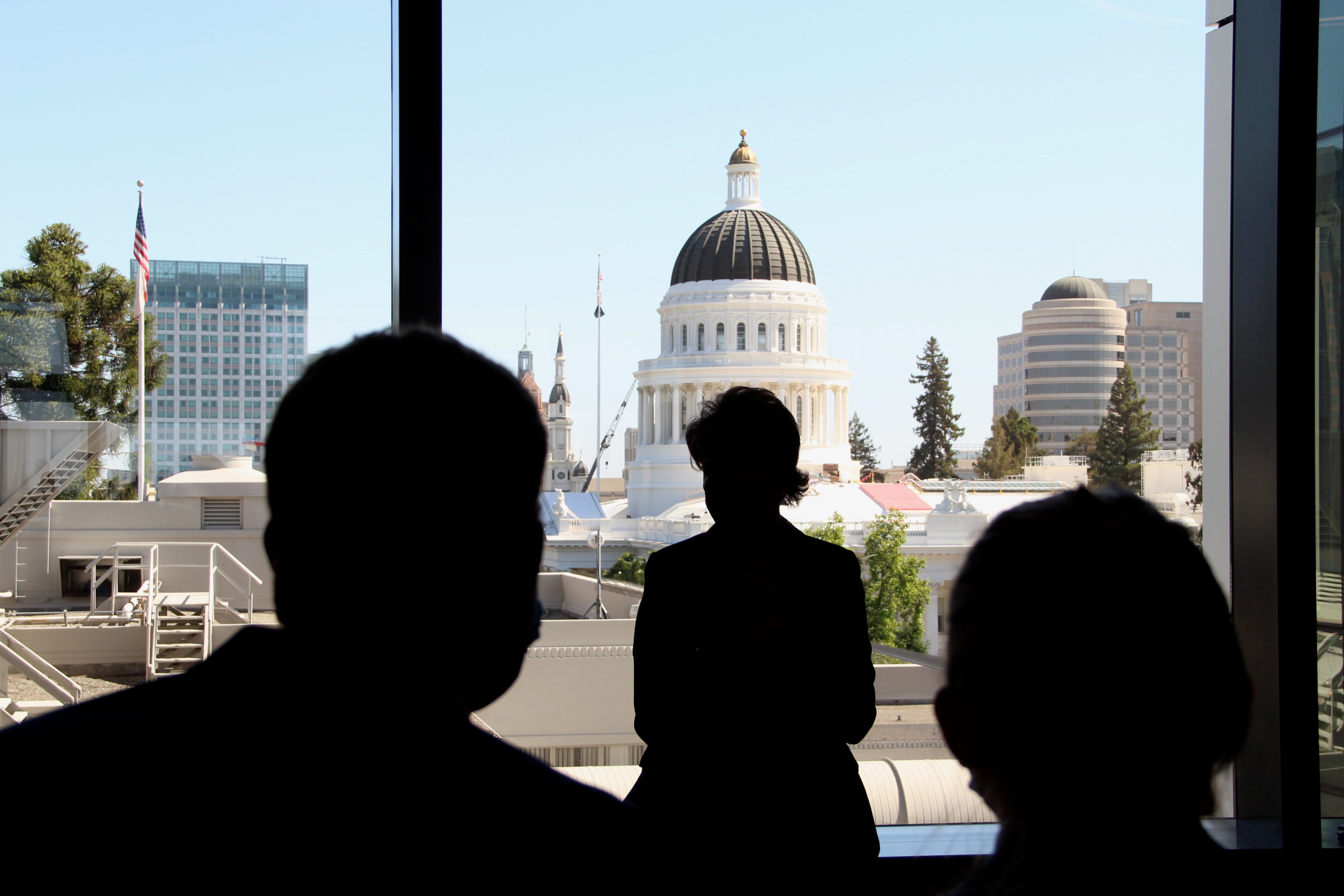a group of people looking at a building