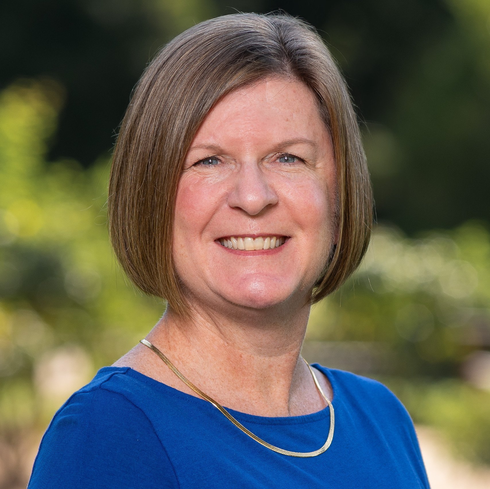 a woman in a blue shirt