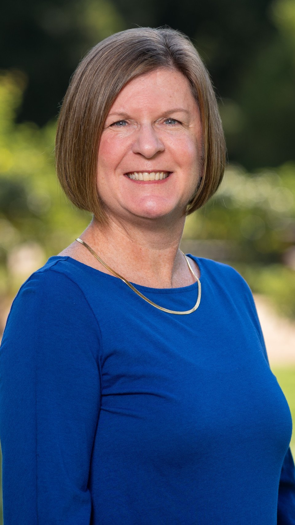 a woman in a blue shirt