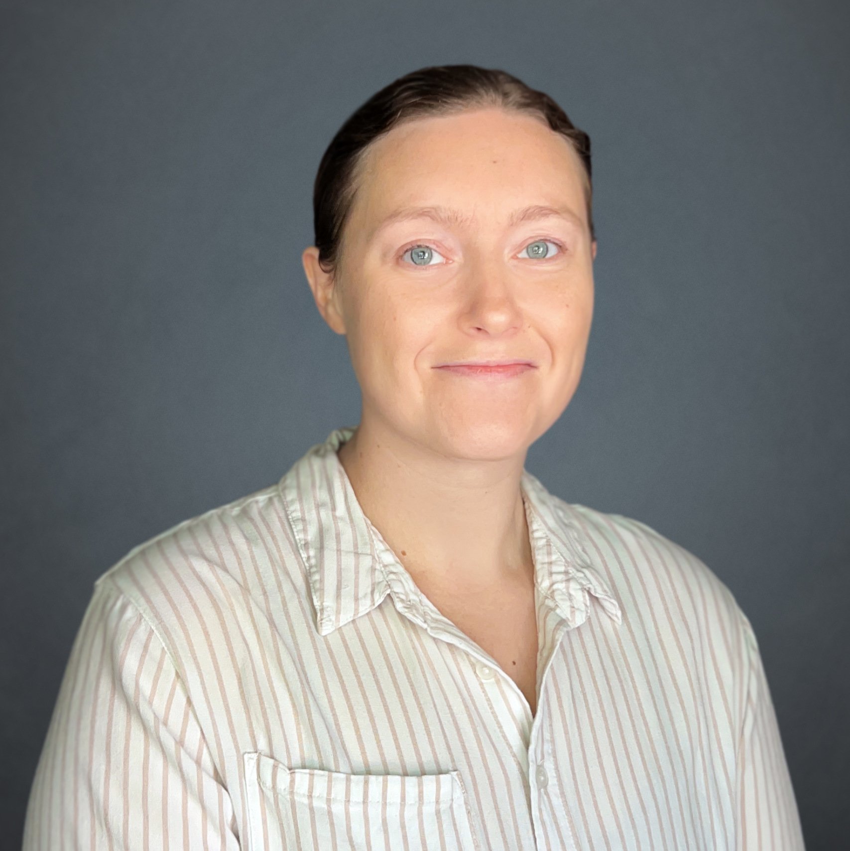 a woman smiling for a picture