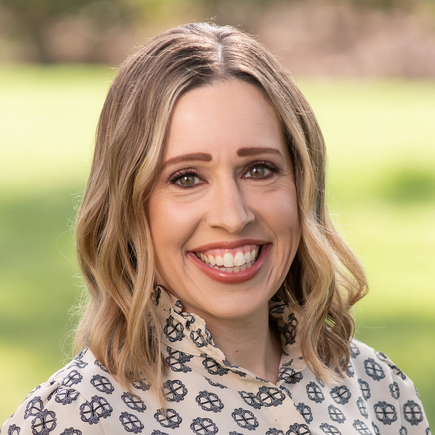 a person smiling at camera