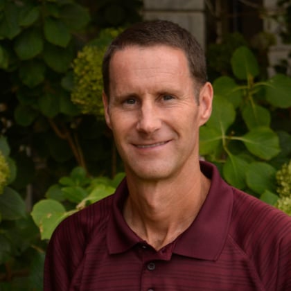 a man in a red shirt