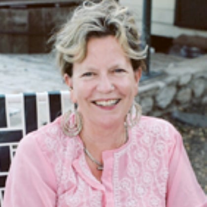 a woman smiling at camera