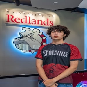 a man standing in front of a sign