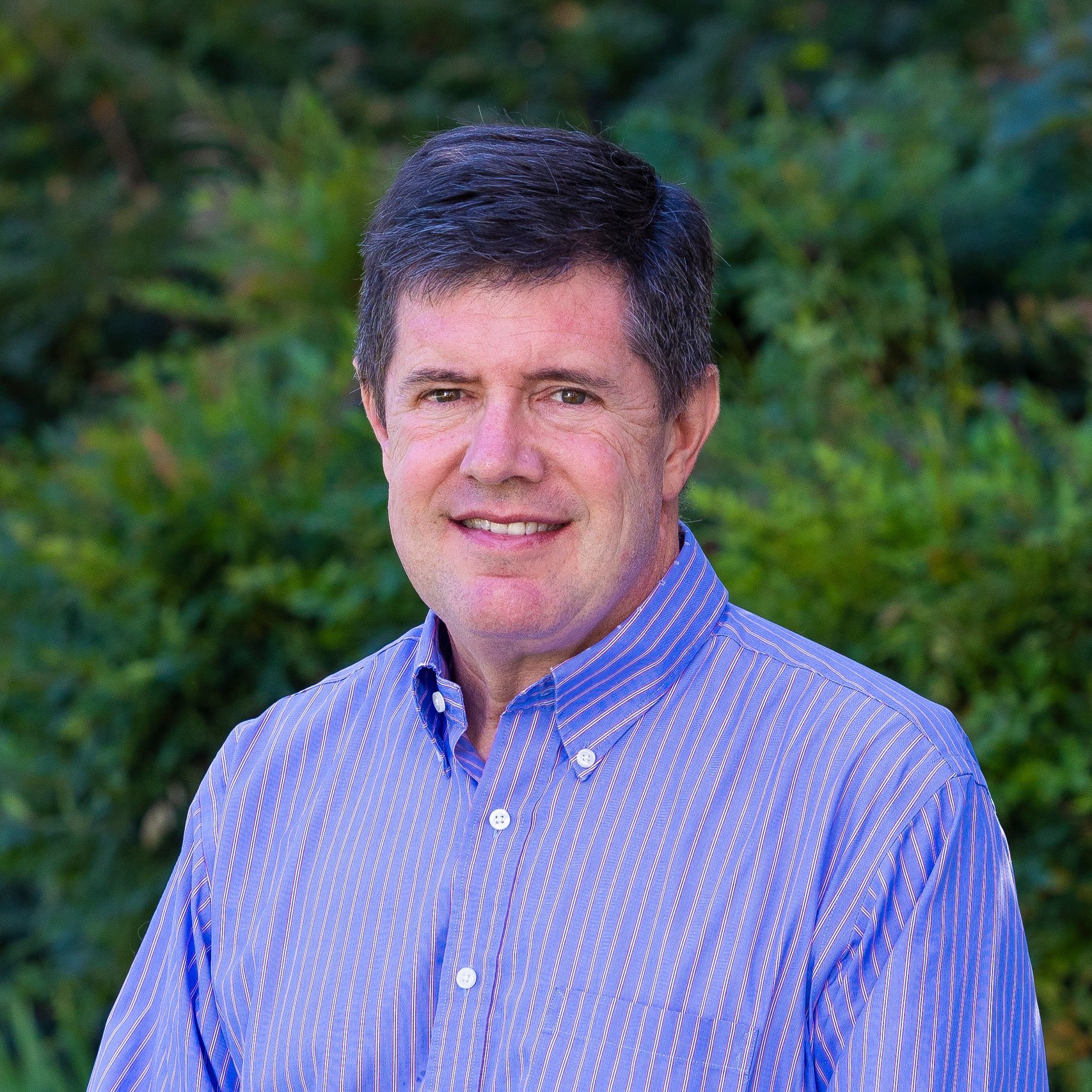 a man in a blue shirt