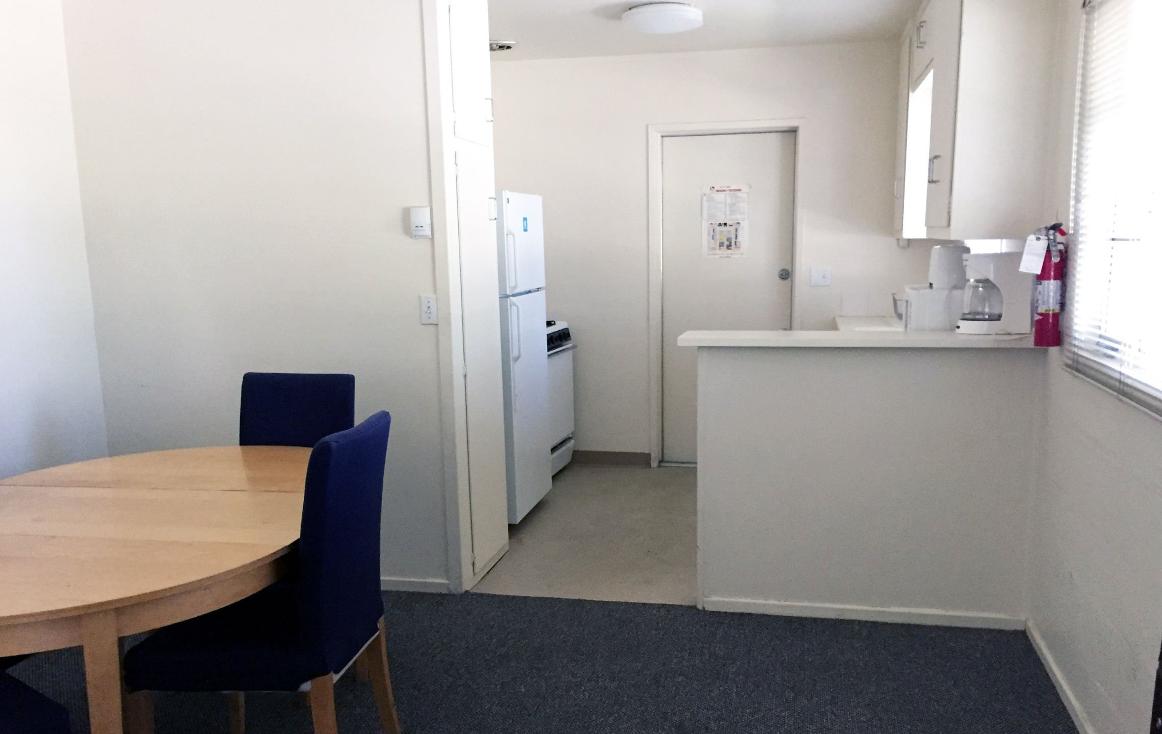 a kitchen and dining area