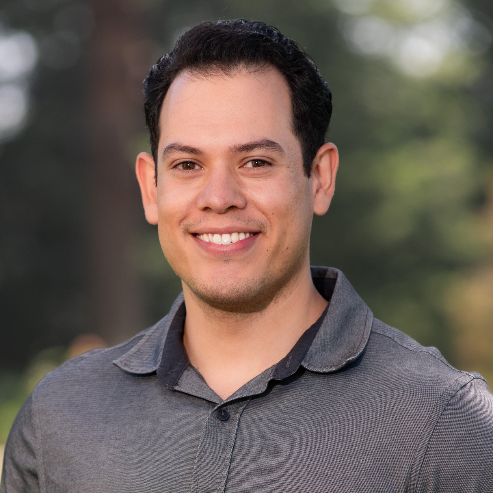 a man smiling for a picture