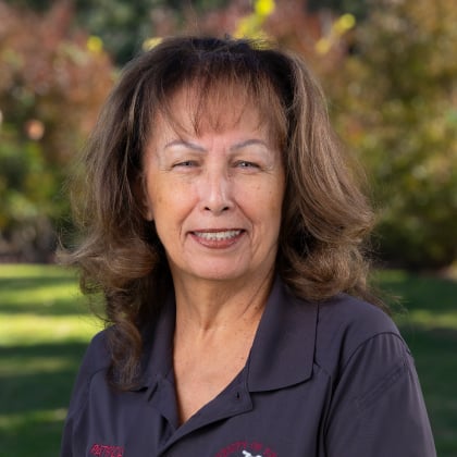 a woman smiling at camera